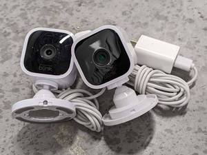 lot 208 image: Lot of 2 - Amazon Blink Mini 1080p Security Camera - 2pk