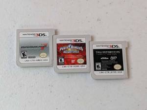 lot 295 image: Lot of 3 - Nintendo 3DS Gamesl Mario Kart 7, Power Rangers MegaForce, Transformers