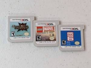 lot 297 image: Lot of 3 - Nintendo 3DS Games Monster Hunter Generations, Lego Marvel Super Heroes, Big Hero 6