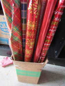 lot 28 image: SMALL BOX OF NEW AND USED WRAPPING PAPER