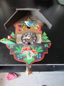 lot 37 image: mini coco clock with mushroom dcor and floral dcor