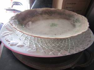 lot 47 image: 4 different types of platters #1- royal porcelain constants platter 15x10, #2- oval clear glass platter 14 diameter, #3- very large white turkey platter 13x18,#4- F.B rogers doubled handled silver platted platter 15x18
