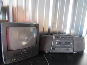 lot 51 image: Emerson TV 14 screen older  model no remote, Magnavox cassette tape player doubble sided with buily in speakers, unknown working condition