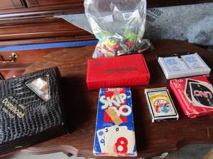 lot 62 image: game lot includes, set of 91 jumbo dominoes double 12, dominoes, skip bo, uno and playing cards