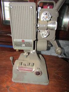 lot 77 image: Kodakscope sixteen movie camera 125 volts model #7883