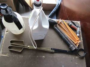 lot 106 image: Yard and garden sprayers, water hose sprayer, fire place log grabber and more