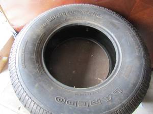 lot 114 image: uniroyal laredo truck tire comes with nail gard size p245-75-r16-109s-ms qty 1