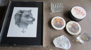 lot 20 image: 14 x 12 A. maggiore framed bear art, bear and moose coaters, set of 4 Texas coasters, 3d saint symbol, and a polar bear rock