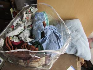 lot 128 image: full size wool blanket, blasket bag of random full and queen sheets and towels and pillow cases