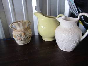 lot 149 image: white wedgwood pitcher, yellow pastel pitcher has minor chips, double handled floral dcor vase