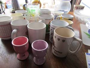 lot 152 image: large lot of coffee cups with sayings on them