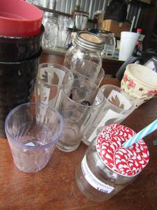 lot 169 image: mason jars, plastic cups, various drinking glasses