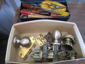 lot 201 image: tool lot various door nobs and door hengis, screw drivers, plyers, razor knife and much more