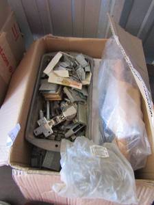lot 213 image: Staples, hanging hooks and more all in one box