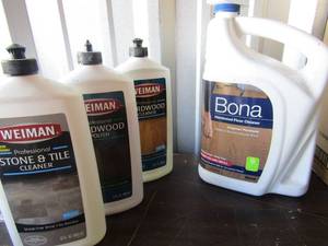 lot 224 image: weiman used hardwood cleaner, hardwood polish, stone & tile cleaner, used bottle of bona hardwood floor cleaner
