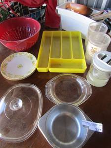 lot 237 image: Kitchen lot includes, strainer, few knifes, ice bucket for freezer, card drinking cups, saucers and 2 glass pot lids