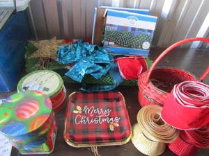 lot 243 image: Tin cans, Christmas entry rug, wicker baskets, Christmas ribbon, and more-- 2 nib sets of 150 bush lights for home dcor outside