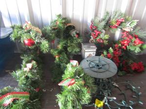lot 244 image: hanging door wreath, porcelain snata musical, roll of colorful hanging Christmas lights, door wreath
