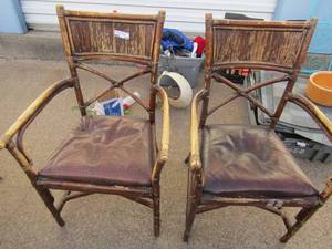 lot 255 image: 2 wooden outdoor chairs, with brown leather padding for seat