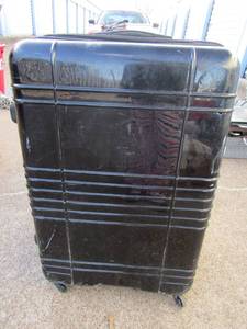 lot 263 image: TRIFORCE large rolling black suitcase, very well used