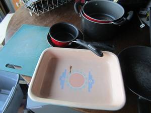 lot 272 image: Green cutting board, various used pots and pans-- Treasure craft mexico made baking dish