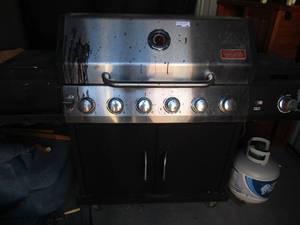 lot 301 image: Outdoor Gourmet grill used propane comes with a empty tank single burner on one side and a steam tray on the other