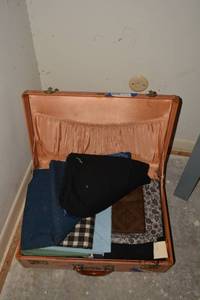 lot 39 image: Vintage suitcase full of vintage fabrics