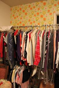 lot 29 image: Rolling clothes rack PLUS clothes (Generous amount, many still have tags)