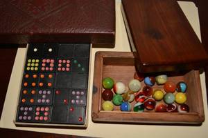 lot 101 image: Vintage marbles and dominoes