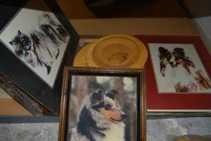 lot 77 image: Picture Frames and Dog photos plus hand carved dogs on wooden plates signed by artist (Picture frames look unused)