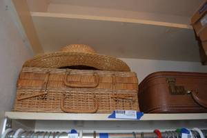 lot 86 image: Picnic basket, straw hat and locked vintage suitcase (havent found key yet)
