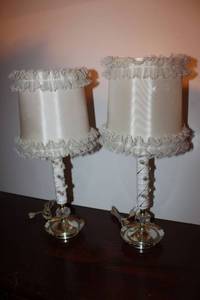 lot 149 image: Vintage Pair of Table lamps - features white column with pink flowers and ruffled lamp shades.