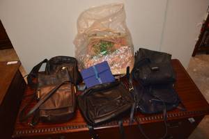 lot 210 image: Purses - Brown, blue, and black leather. Plus vintage Empress floral bag