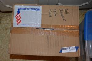 lot 232 image: Unopened Double case box of nylon twine. Label says type A size 36.