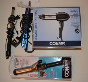 lot 233 image: Hair care lot - unopened hair dryer and curling iron, flat iron and curling iron used.