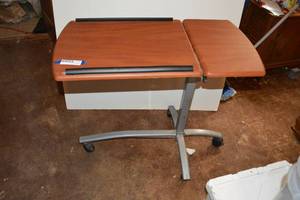 lot 259 image: Rolling table with adjustable height and tilt. See pictures