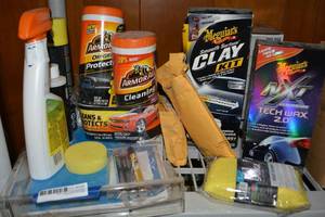 lot 256 image: Car cleaners - ArmorAll wipes, wax kits, bug and tar cleaner, touch-up paint pens and sponges.