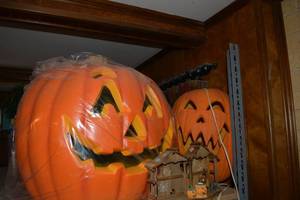 lot 268 image: Halloween pumpkin decorations as shown. Large one is at least 2 ft. x 2ft.