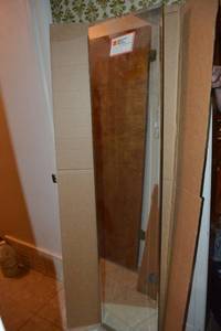lot 241 image: Beveled wall mirror - 16W x 68H. Was still in box with sticker, appears unused.