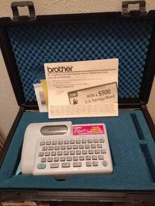 lot 266 image: Brother P-touch label maker with case