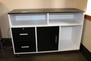 lot 12 image: Black and white rolling storage cabinet