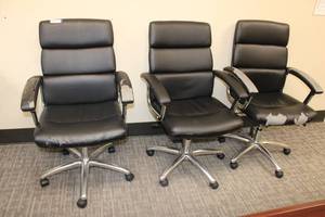 lot 17 image: (3) Black rolling office chairs with chrome base as shown