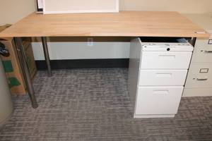 lot 35 image: Gerton IKEA Solid wood countertop table with chrome adjustable legs (adjusts from 27.5 to 43H) plus Knoll 3-drawer under desk file cabinet