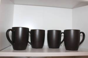 lot 37 image: Paradiso Onyx coffee mugs by Gibson (approx. 29 cups)