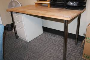 lot 38 image: Gerton IKEA Solid wood countertop table with chrome adjustable legs (adjusts from 27.5 to 43H) plus Knoll 3-drawer under desk file cabinet (table top contents sold separately)