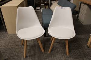 lot 64 image: (2) White plastic modern chairs