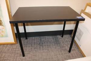 lot 87 image: Dark brown Table with black metal legs 39x24