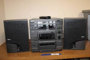 lot 106 image: RCA compact audio system with remote