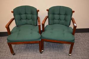lot 152 image: (2) Rolling wood frame chairs with green cushions