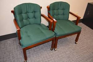 lot 155 image: (2) Rolling wood frame chairs with green cushions